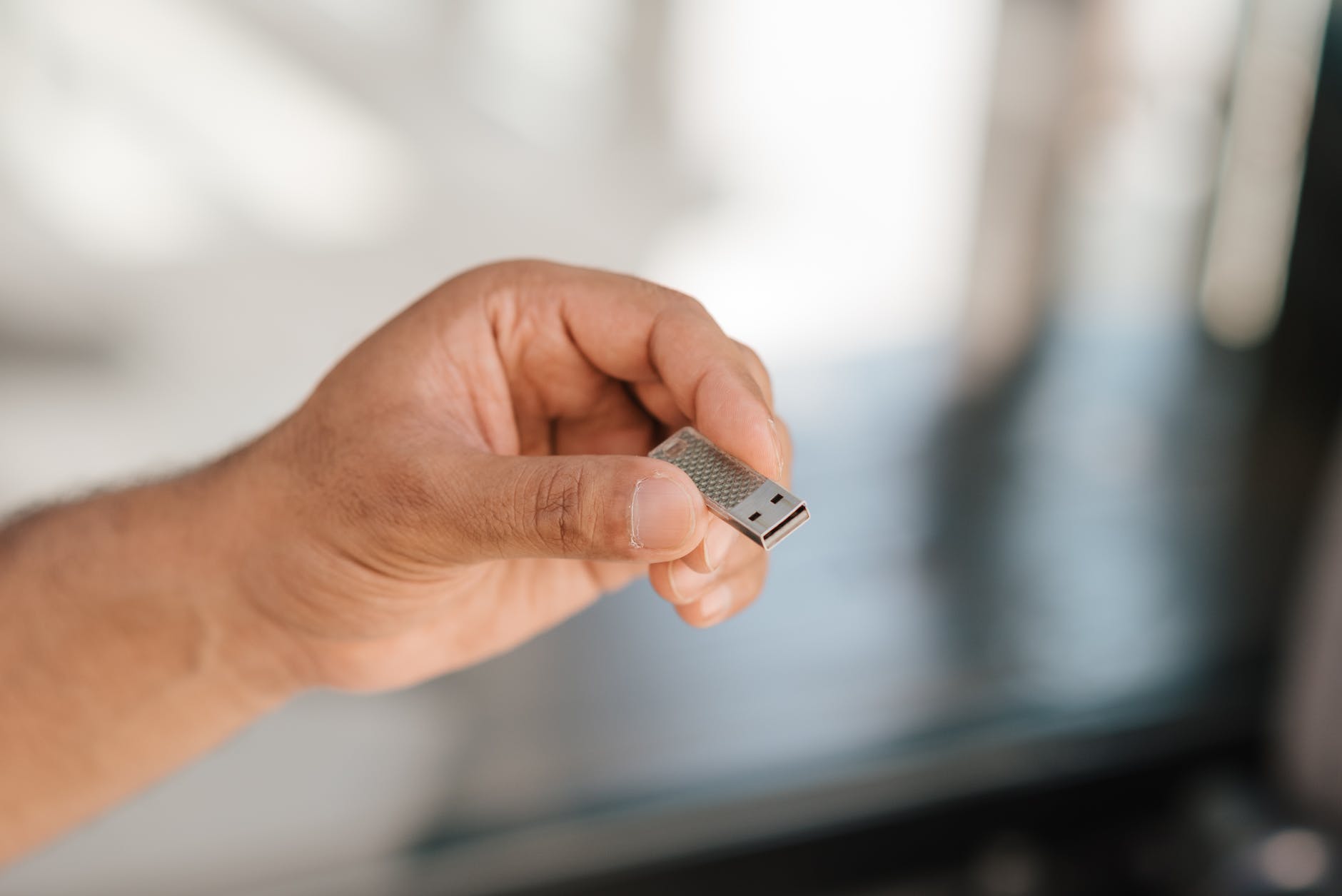 Man holding with with USB WiFi Adapter